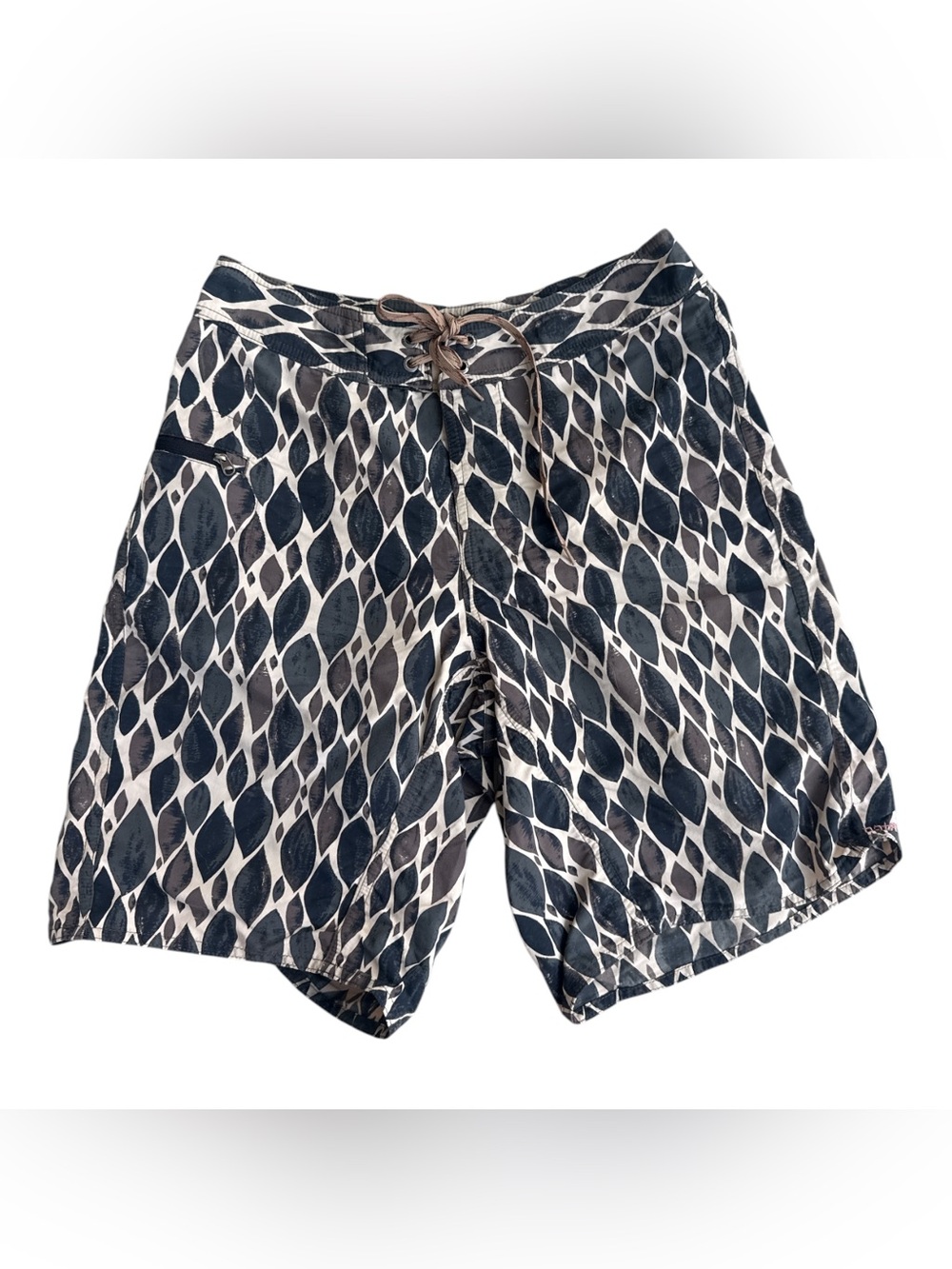 Patagonia Men's Wavefarer Boardshorts featuring an all-over dark leaf print